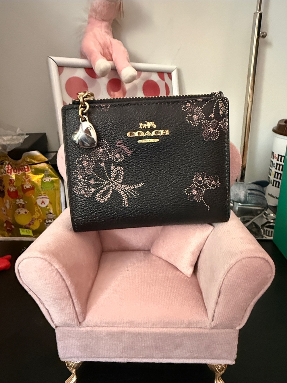Coach Black Pebbled Zip Wallet with Pink Floral Accents and Heart Charm